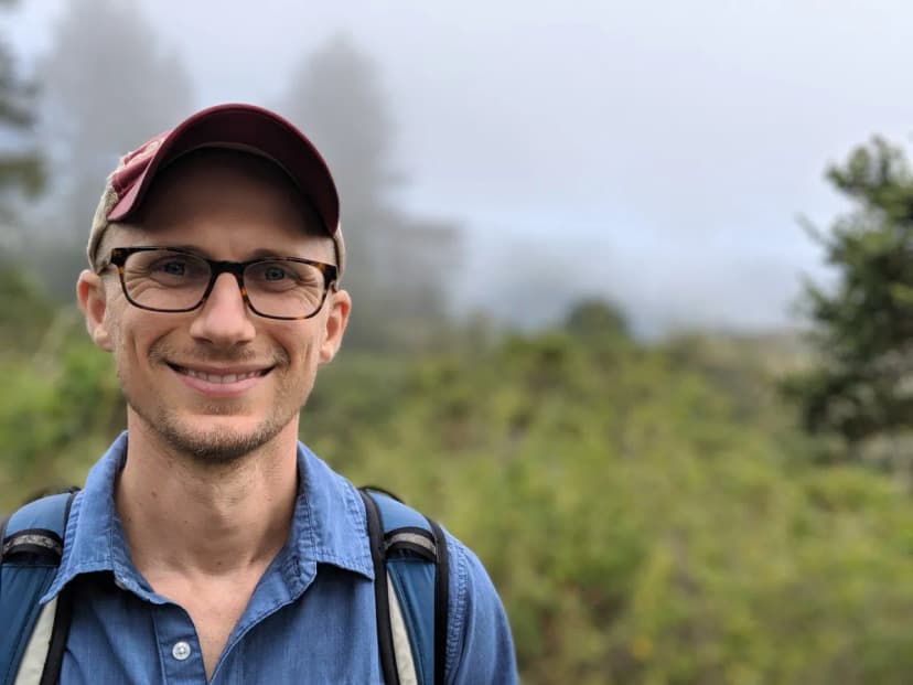 Matt Headley hiking in foggy woods