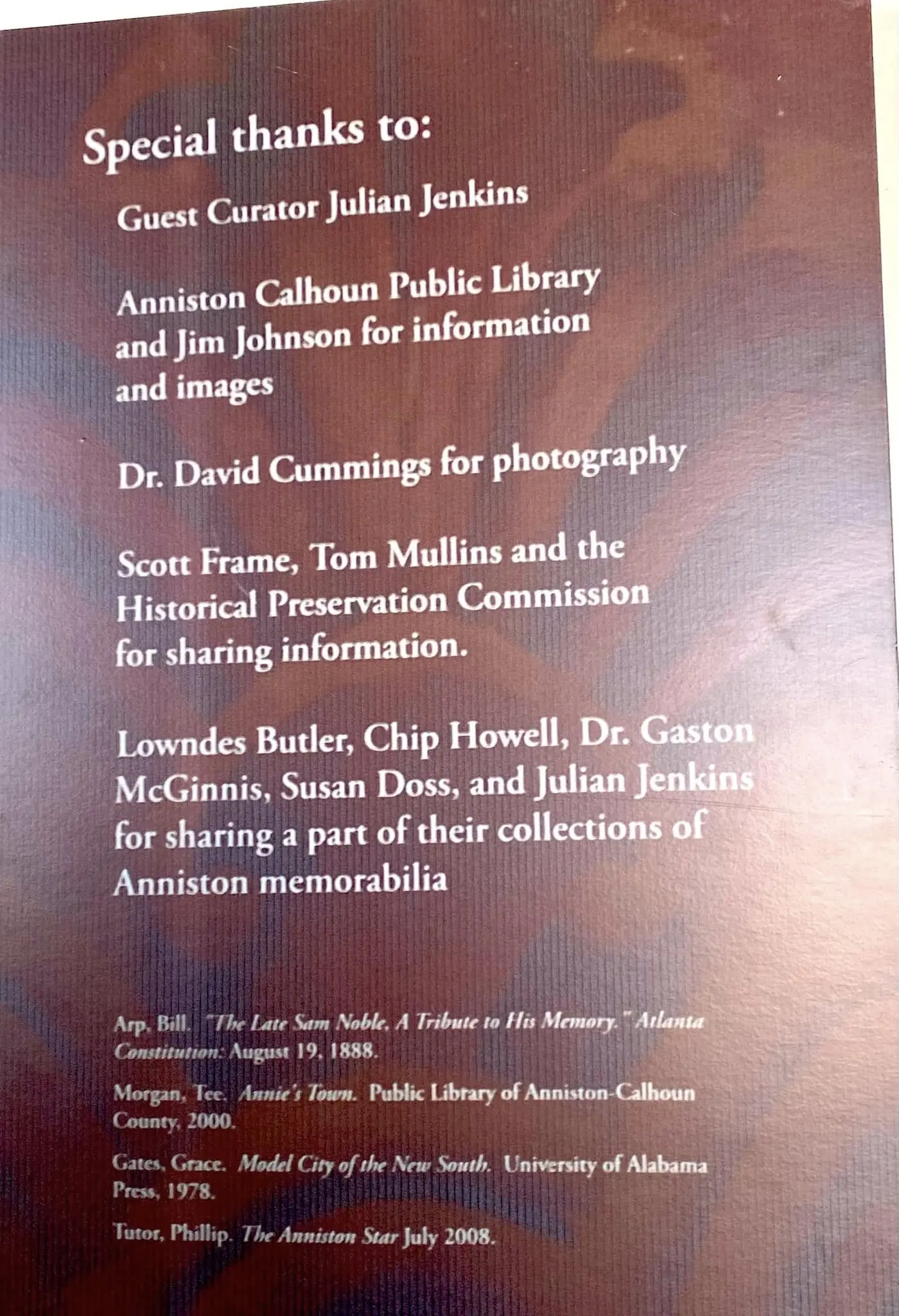 Museum acknowledgment card crediting Guest Curator Julian Jenkins for sharing his collection of Anniston memorabilia