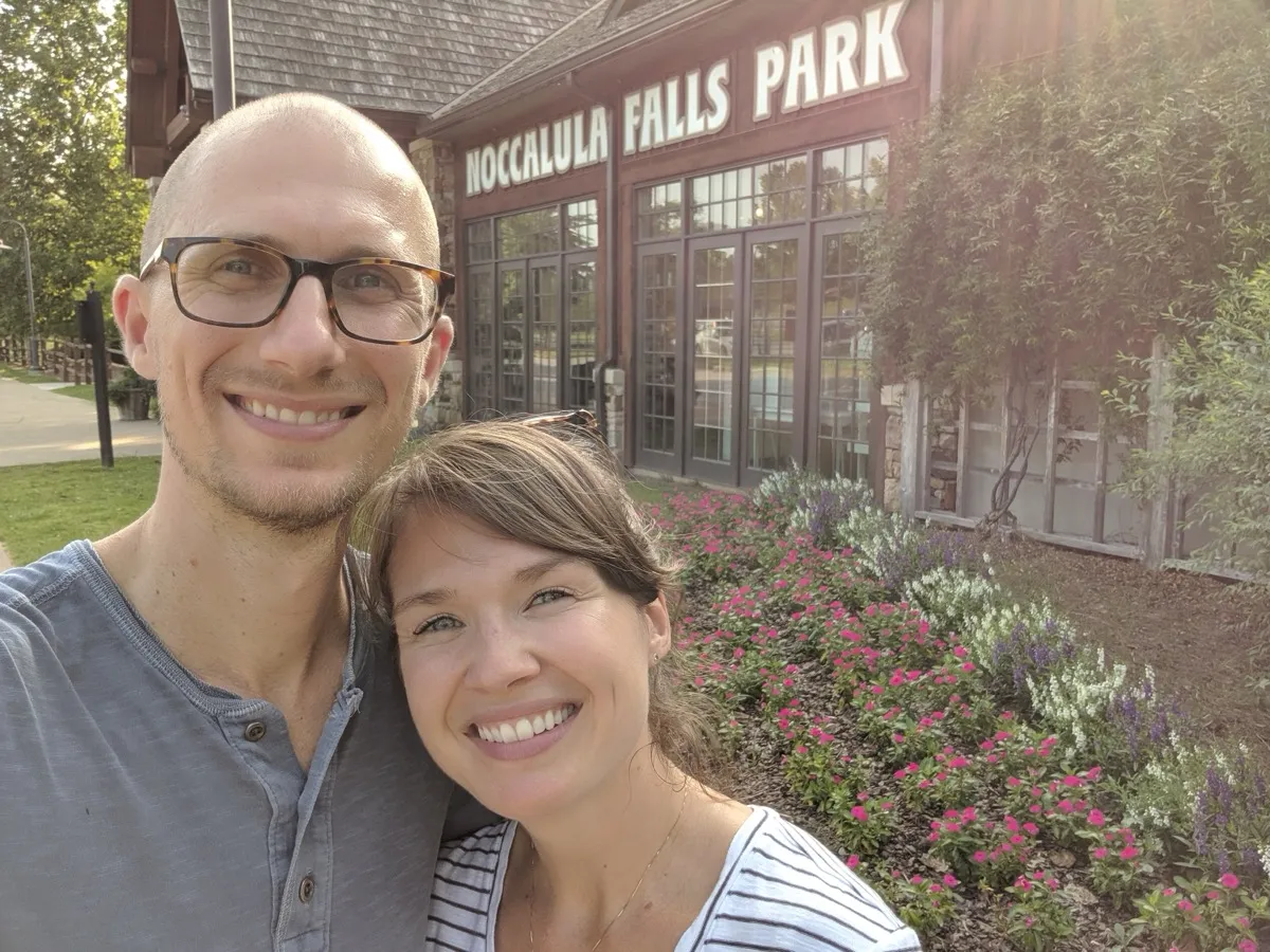 Matt and Heather Headley in front of the Noccalula Falls Park entrance sign, June 2019